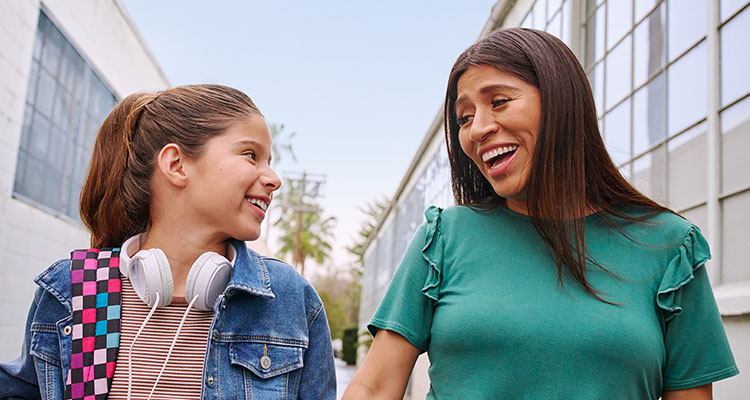 A mother speaks to her daughter